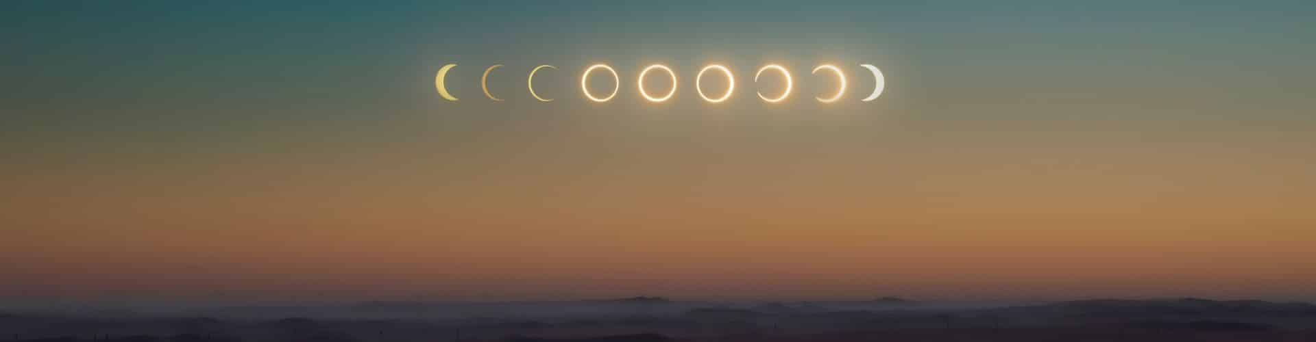Sequence of solar eclipse phases rising above the Spanish horizon during the 2026 solar eclipse