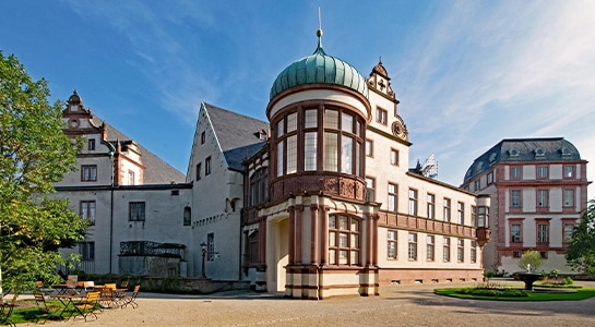 Scenic buildings in Darmstadt looking like parts of a castle.