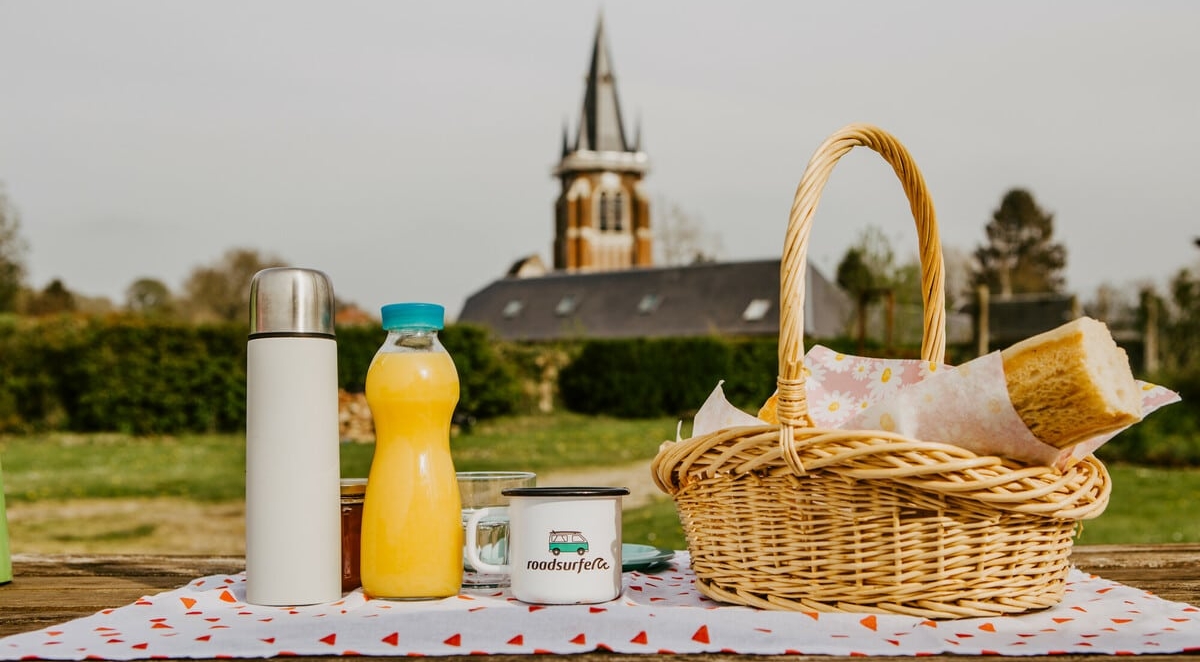 A Picnic Set Up In Front Of A Church