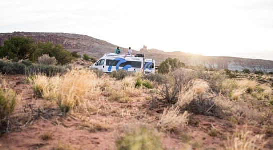 RV parked in the red desert near Williams, Arizona during an Arizona road trip