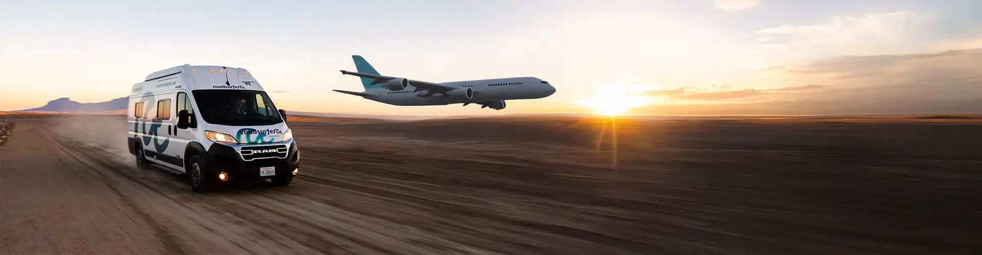 Boxvan and plane racing on the desert during sunset.