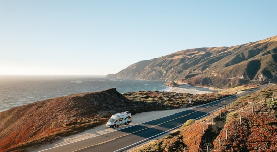 roadsurfer RV camper driving along the California coast