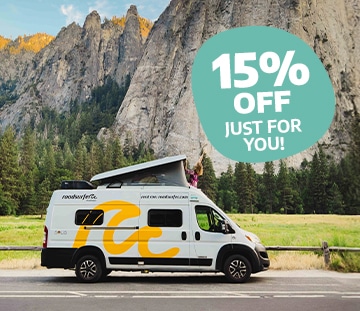 Camper Van Driving Through Yosemite Park