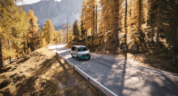 Camper driving on the road in the mountains