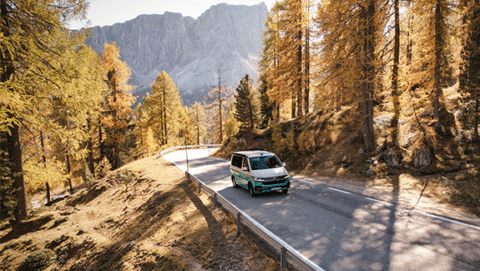 Camper driving on the road in the mountains