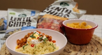 Delicious chickpea tomato, harissa stew and couscous with crispy chip topping