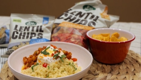 Delicious chickpea tomato, harissa stew and couscous with crispy chip topping