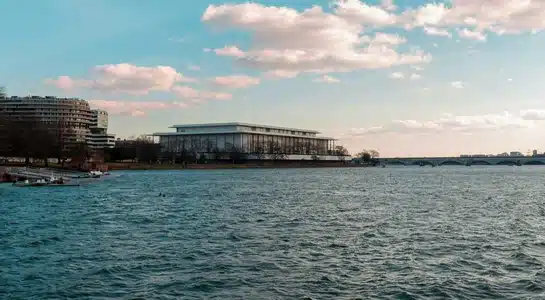 Waterfront view with modern buildings and calm water in Cape Canaveral, Florida.