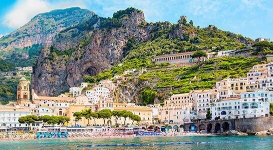 Panorama view of Italy's Amalfi Coast with colourfull houses at the beach