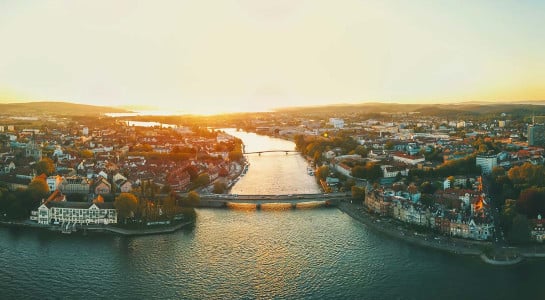 Skyline of Constance at sunset with river and city view