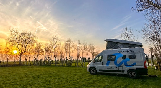 Fiat Ducato campervan standing on a field