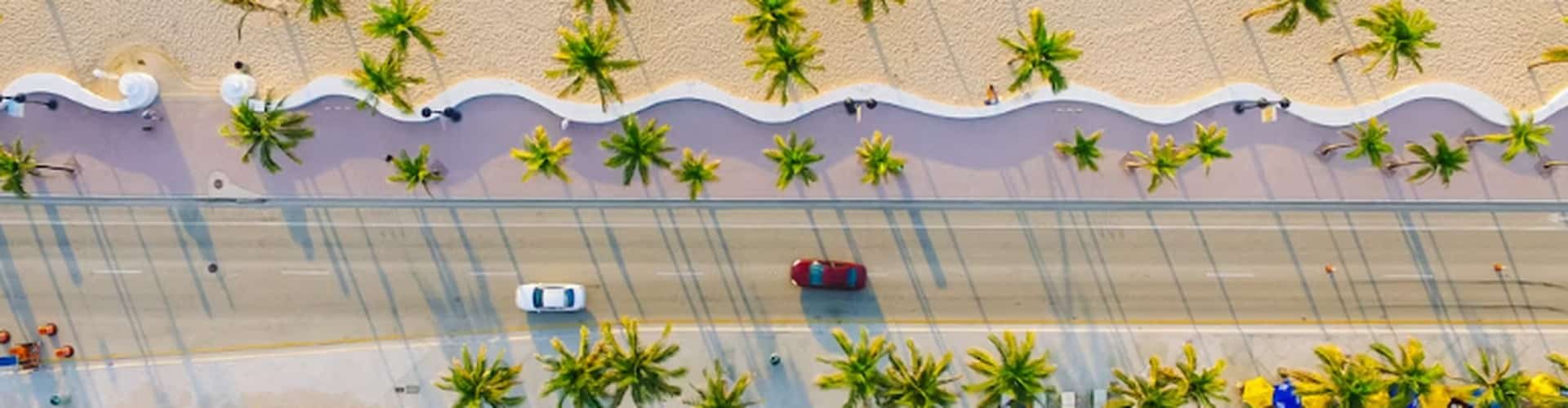 Palm-lined Highway A1A along the Fort Lauderdale beachfront, a scenic stop on an East Coast RV road trip.