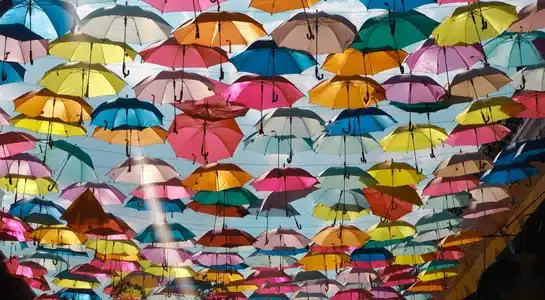 Rows of colorful umbrellas hanging above Giralda Plaza in Coral Gables, Miami.