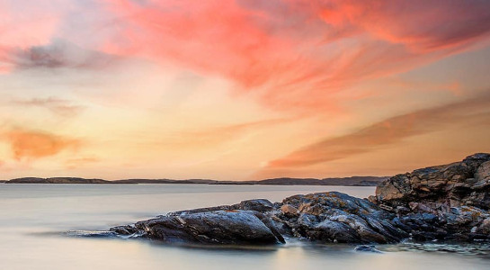 Gothenburg, Sweden rocky coastline by the water at sunset