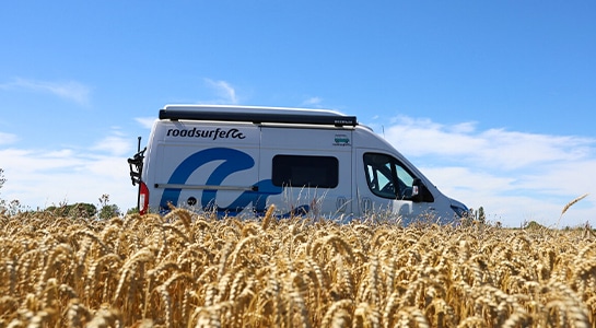 motor home in the field in summer