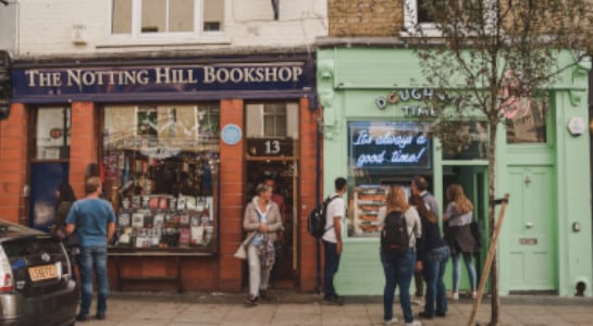 People walking outside of the Nottinghill bookshop in London