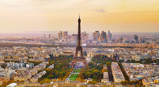 Paris skyline with Eiffel Tower at sunset