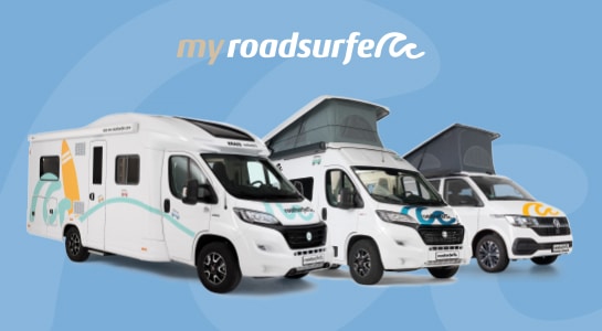 myroadsurfer sales logo above roadsurfer camper van, sprinter, and RV parked next to each other to show the different model types offered, on a blue background