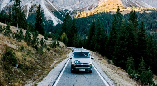 roadsurfer campervan on a mountain road