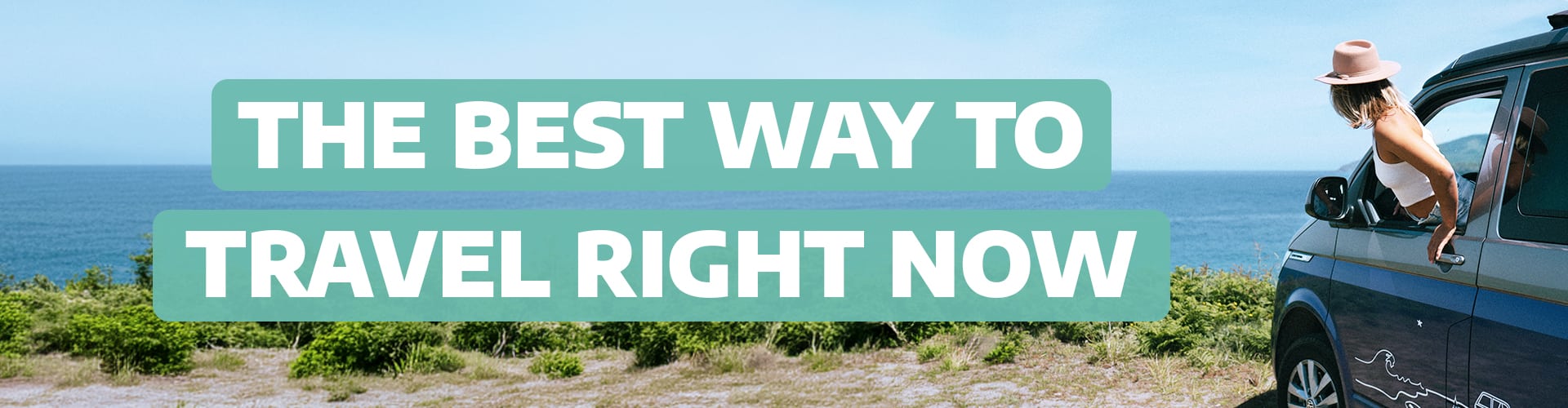 Woman looking out of a camper van towards the sea with the text "The best way to travel right now"