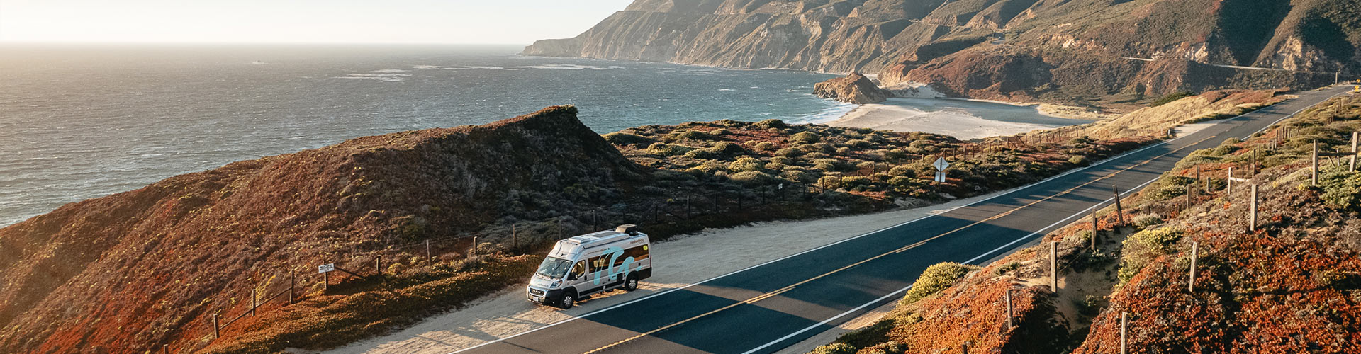 roadsurfer RV camper van parked along Southern California coastline