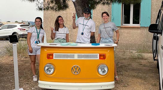 roadsurfer sales team standing at a desk