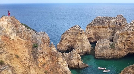 Some rocks in the ocean of Portugal's coast