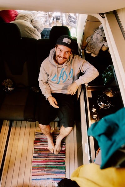 Man sitting inside an RV interior for an RV classes guide