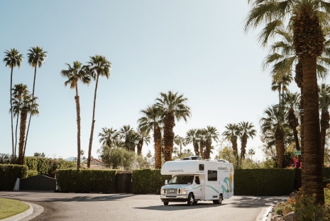 RV parked between palmtrees