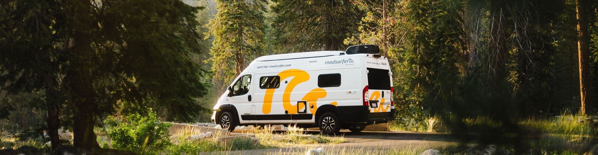 RV Rental Prices for Camper Vans on Scenic Forest Roads