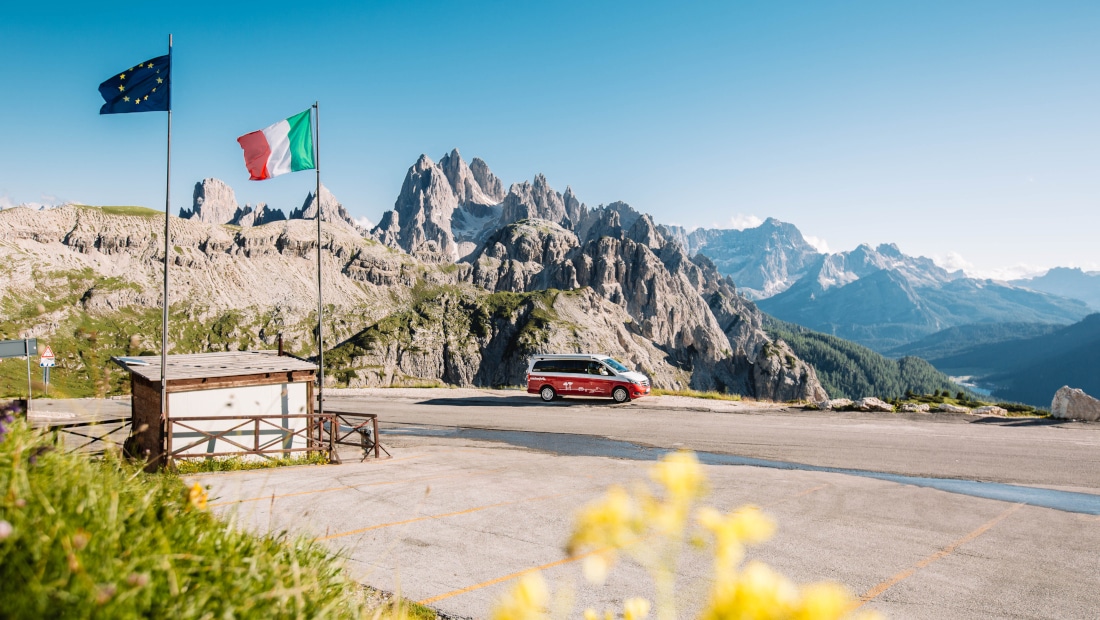 van on a plateau in the italian mountains