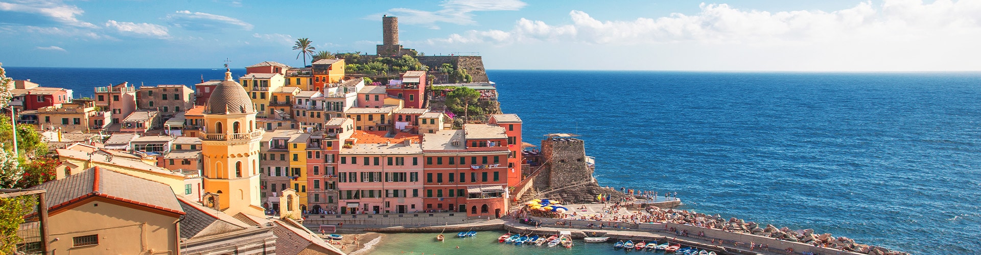 Colorful village built around a harbor.