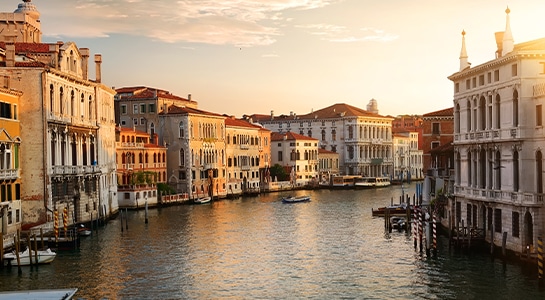 View of a canal in Venice at sunset