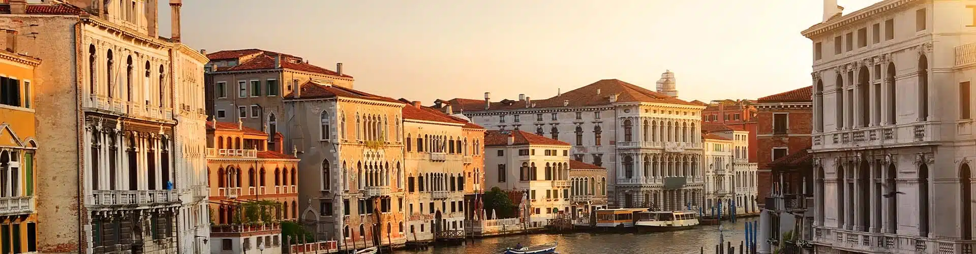 View of a canal in Venice at sunset