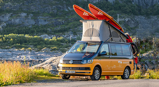 vw campervan with summer holiday equipment