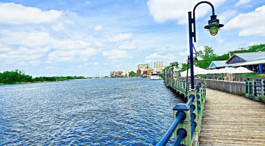 Boardwalk view of the Cape Fear River in Wilmington, North Carolina, a stop on an East Coast RV road trip