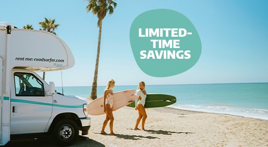 Women Headed To Surf From An RV EN US