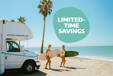 women-headed-to-surf-from-an-RV