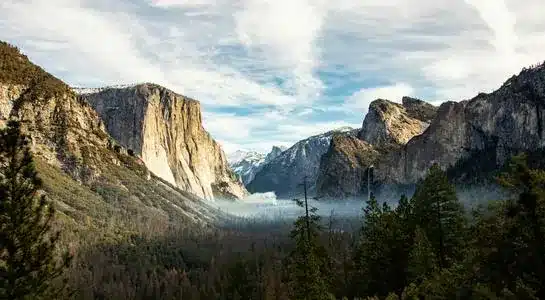 Expansive view of Yosemite Valley with El Capitan and Half Dome from Tunnel View